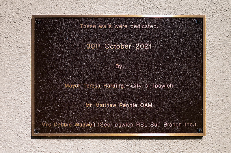 Dedication plaque at the Ipswich Memorial Wall listing the officials who attended its unveiling in October 2021.