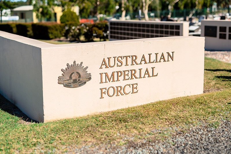 Memorial wall section displaying the Australian Imperial Force insignia.