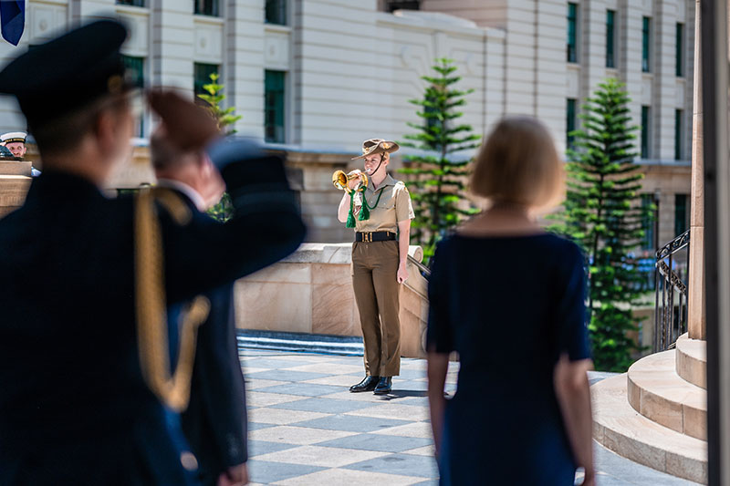 Bugler performing the Last Post during a commemorative service.
